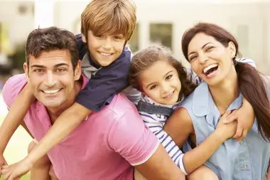 depositphotos_59876915-stock-photo-happy-family-in-garden