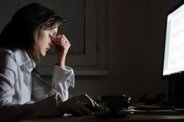 depositphotos_7171280-stock-photo-tired-business-person-with-headache